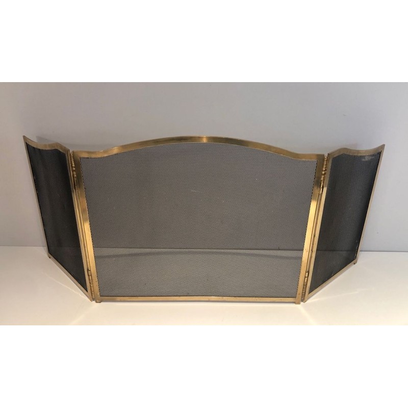 Three-Panel Neoclassical Brass and Wire Mesh Folding Fireplace Screen with Arched Centre. France. Circa 1970.