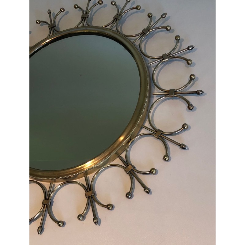 Modernist Brass and Brushed Steel Floral Wreath Sunburst Mirror. France. Circa 1970.
