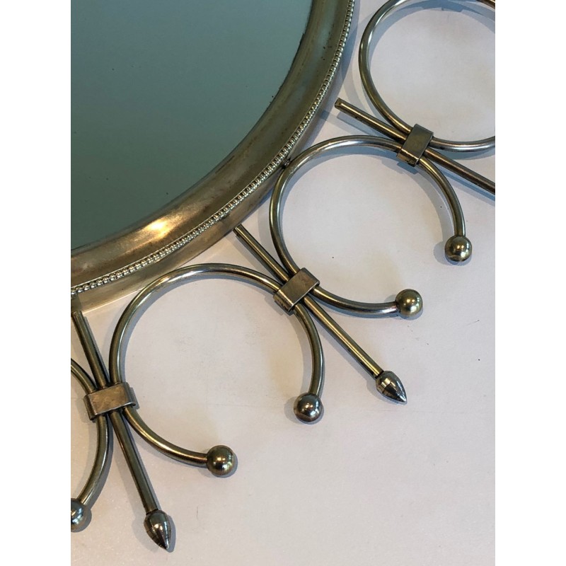 Modernist Brass and Brushed Steel Floral Wreath Sunburst Mirror. France. Circa 1970.