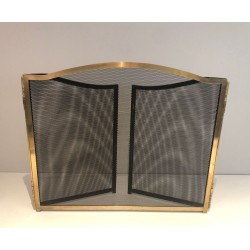 Three-Panel Neoclassical Brass and Wire Mesh Folding Fireplace Screen with Arched Centre. France. Circa 1970.