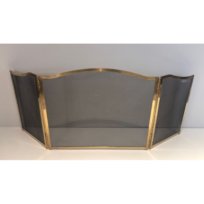 Three-Panel Neoclassical Brass and Wire Mesh Folding Fireplace Screen with Arched Centre. France. Circa 1970.
