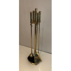 Modernist Brass Fireplace Companion Set with Cylindrical Handles on Stand. France. Circa 1970.