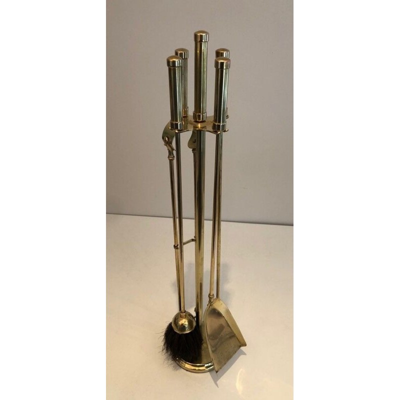 Nécessaire de Feu Moderniste en Laiton à Manches Cylindriques sur Support. France. Vers 1970.