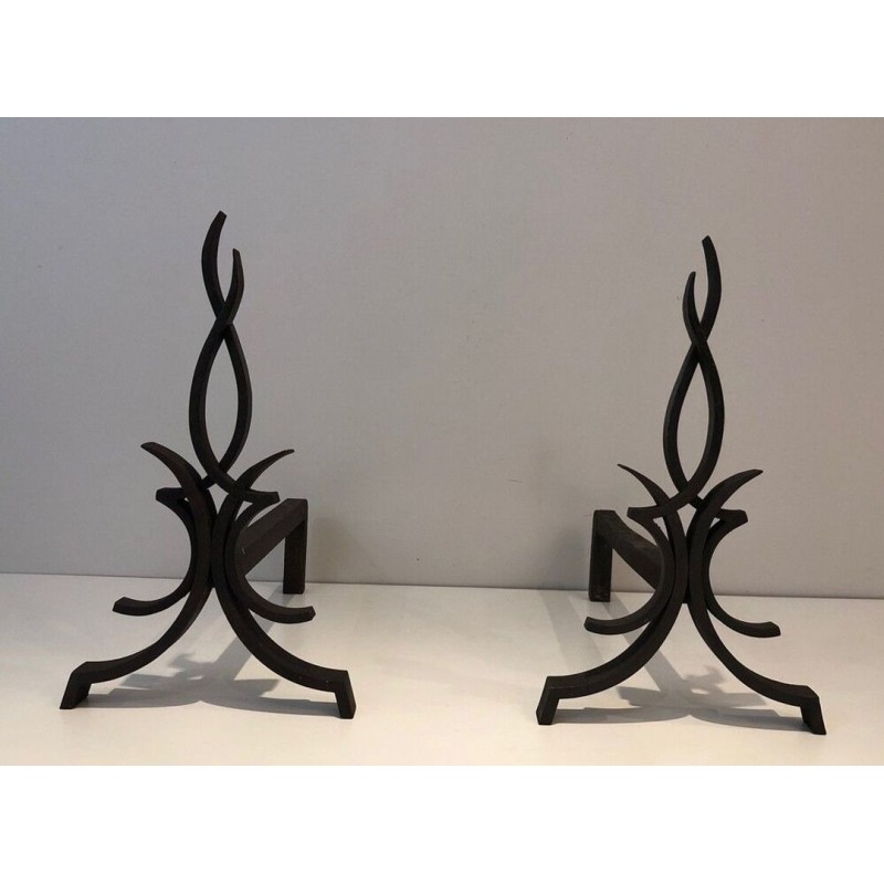 Pair of Wrought Iron Andirons with Foliate and Flame Decoration by Raymond Subes. France. Circa 1940.