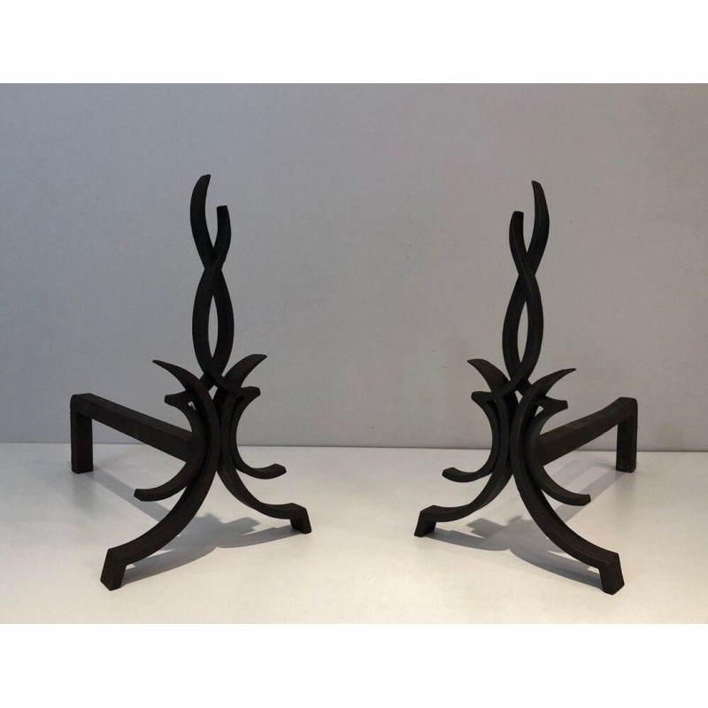 Pair of Wrought Iron Andirons with Foliate and Flame Decoration by Raymond Subes. France. Circa 1940.
