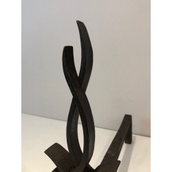 Pair of Wrought Iron Andirons with Foliate and Flame Decoration by Raymond Subes. France. Circa 1940.