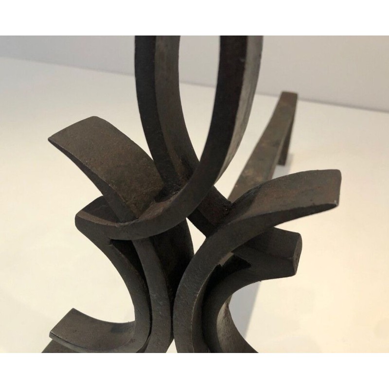 Pair of Wrought Iron Andirons with Foliate and Flame Decoration by Raymond Subes. France. Circa 1940.