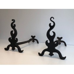 Pair of Cast Iron and Wrought Iron Andirons with Flame Decoration. France. Circa 1940.