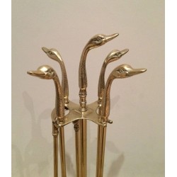 Brass Fireplace Companion Set with Duck-Head Handles on Stand. In the Style of Maison Jansen. France. Circa 1960.