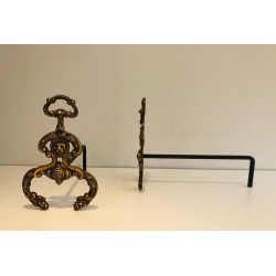 Pair of Neoclassical Bronze and Wrought Iron Andirons with Lion Mascarons. France. Circa 1940.