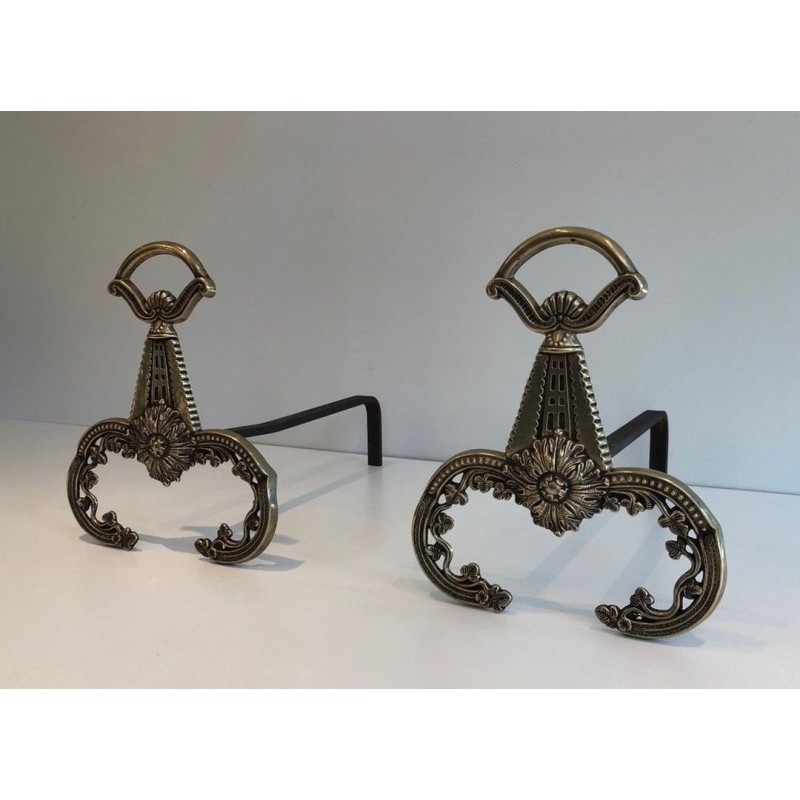 Pair of Neoclassical Bronze Andirons with Foliate Decoration and Scroll Feet. France. Circa 1900.