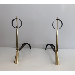 Pair of Modernist Brass and Wrought Iron Andirons with Ring Finials. Italy. Circa 1950.