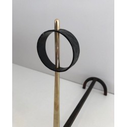 Pair of Modernist Brass and Wrought Iron Andirons with Ring Finials. Italy. Circa 1950.