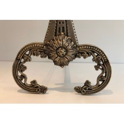 Pair of Neoclassical Bronze Andirons with Foliate Decoration and Scroll Feet. France. Circa 1900.