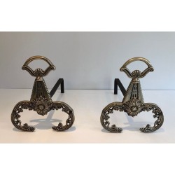 Pair of Neoclassical Bronze Andirons with Foliate Decoration and Scroll Feet. France. Circa 1900.