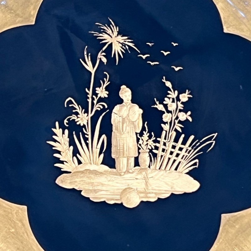 Suite of Eight Black-Ground Gilt Porcelain Plates with Chinoiserie Décor, Delvaux Paris