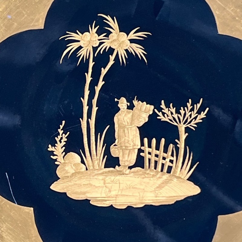 Suite of Eight Black-Ground Gilt Porcelain Plates with Chinoiserie Décor, Delvaux Paris