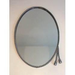 Pair of Oval Silvered Mirrors attributed to Maison Bagués