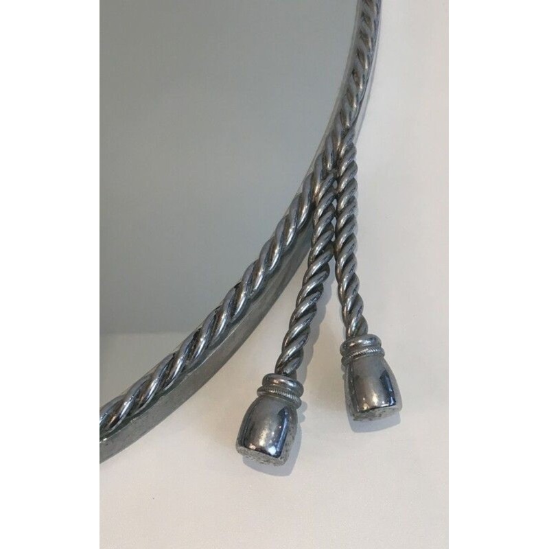 Paire de Miroirs Ovales Argentés attribués à la Maison Baguès