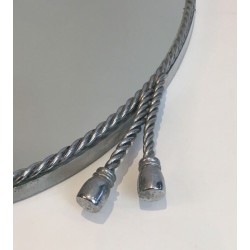 Paire de Miroirs Ovales Argentés attribués à la Maison Baguès