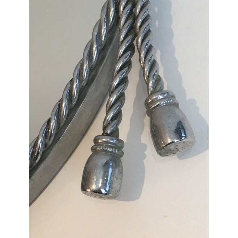 Paire de Miroirs Ovales Argentés attribués à la Maison Baguès