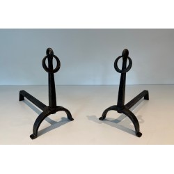 Pair of Wrought Iron Andirons in the style of Jacques Adnet