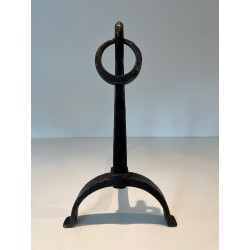 Pair of Wrought Iron Andirons in the style of Jacques Adnet