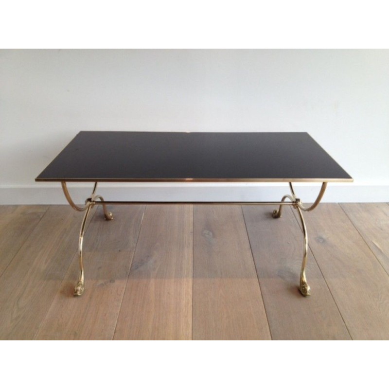 Brass Coffee Table with Dolphin Heads and Black Lacquered Glass Top. French Work by Maison Jansen. Circa 1940