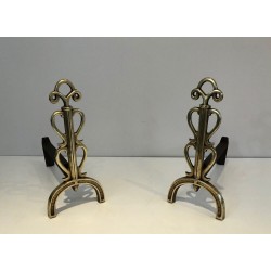 Pair of Brass and Wrought Iron Andirons, in the Style of Raymond Subes, circa 1940