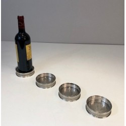 Suite de 4 Dessous de Bouteilles en Métal Argenté