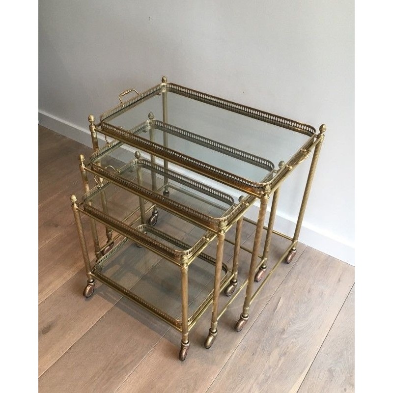 Set of Three Neoclassical Brass Nesting Tables on Casters, Attributed to Maison Baguès