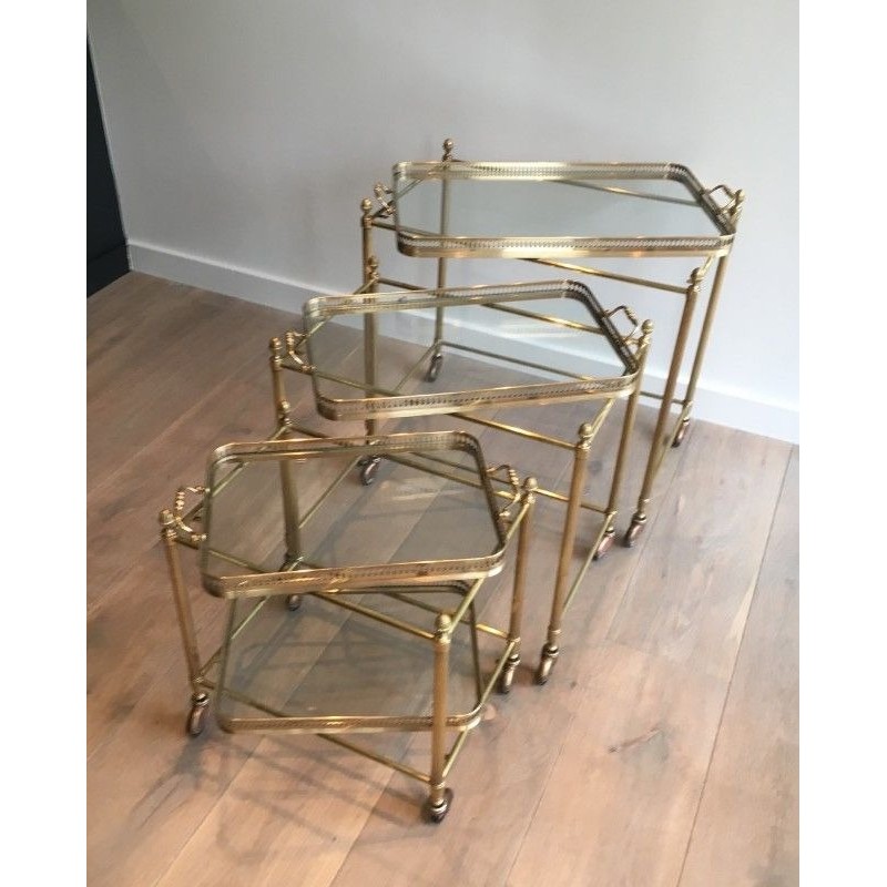 Set of Three Neoclassical Brass Nesting Tables on Casters, Attributed to Maison Baguès