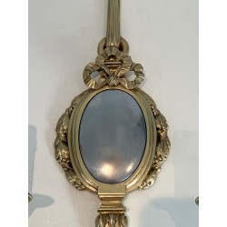 Set of Four Louis XVI Style Chiseled Bronze and Chrome Wall Sconces with Bow and Ribbon Decoration
