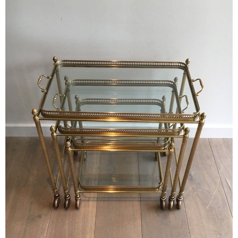 Set of Three Neoclassical Brass Nesting Tables on Casters, Attributed to Maison Baguès