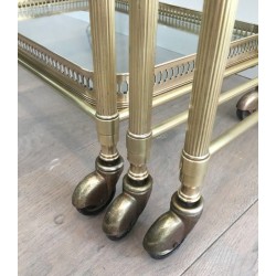 Set of Three Neoclassical Brass Nesting Tables on Casters, Attributed to Maison Baguès