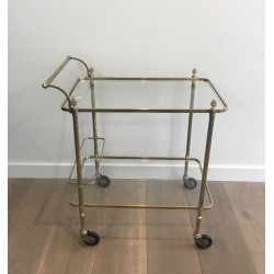 Neoclassical brass drinks trolley by Maison Bagués. Circa 1940