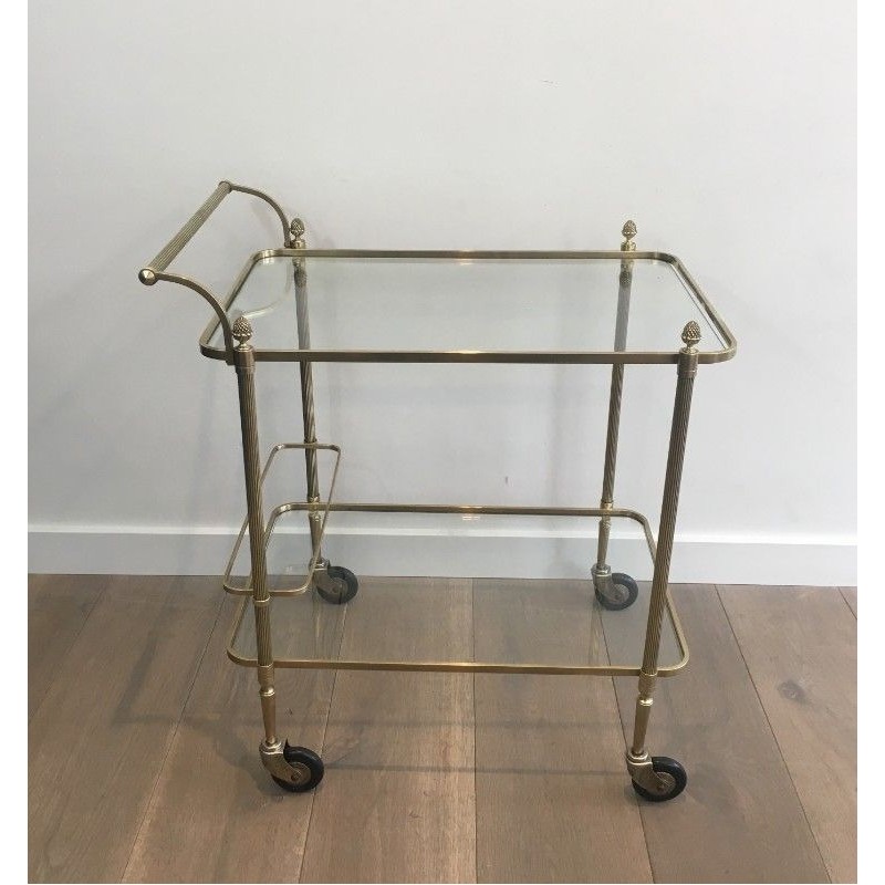Neoclassical brass drinks trolley by Maison Bagués. Circa 1940