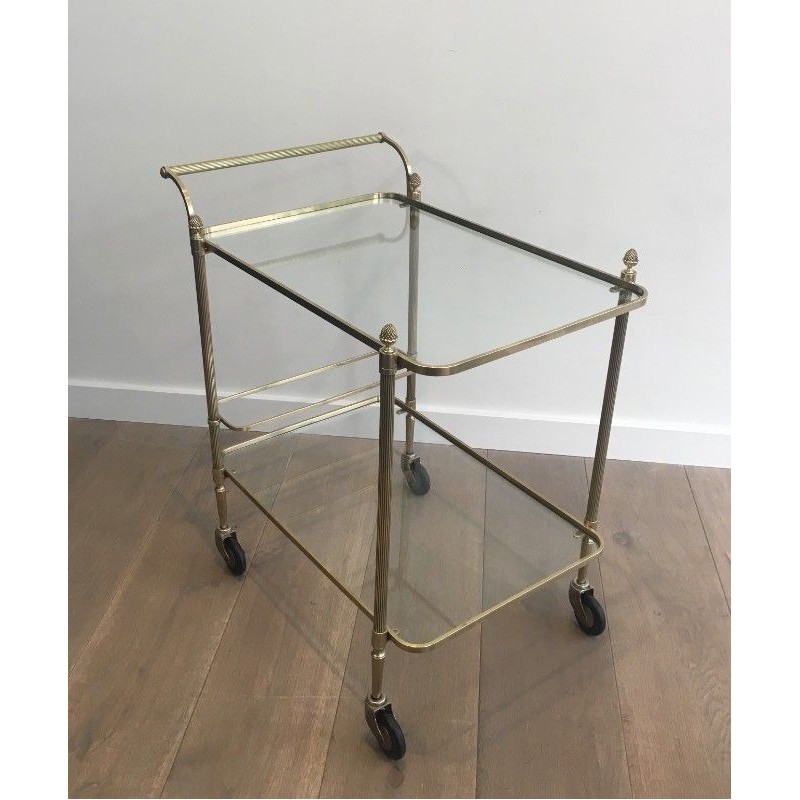 Neoclassical brass drinks trolley by Maison Bagués. Circa 1940