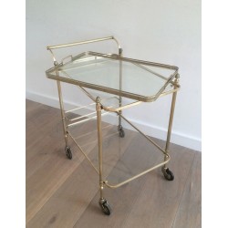 Neoclassical brass drinks trolley by Maison Bagués. Circa 1940