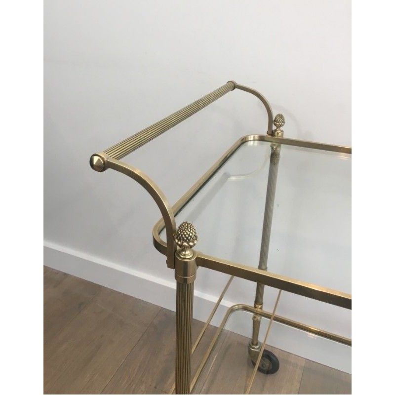 Neoclassical brass drinks trolley by Maison Bagués. Circa 1940
