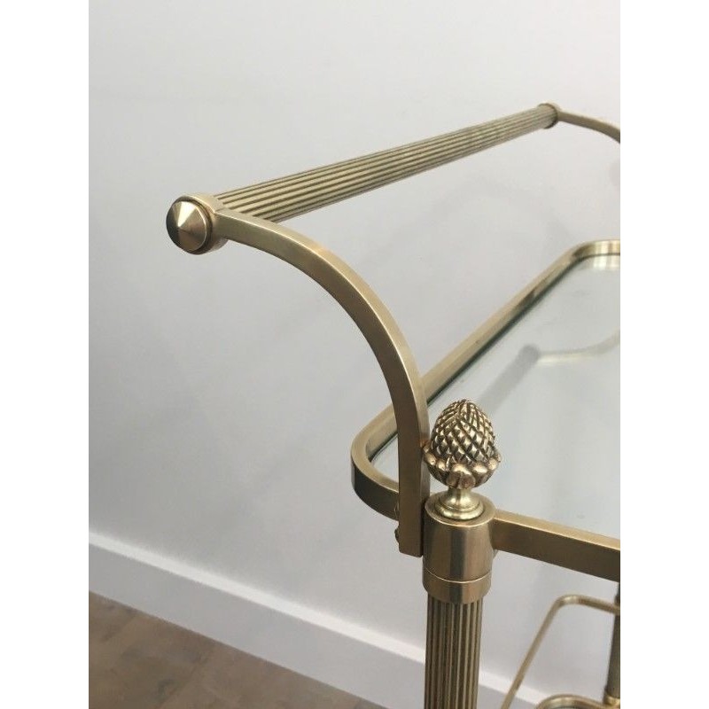 Neoclassical brass drinks trolley by Maison Bagués. Circa 1940