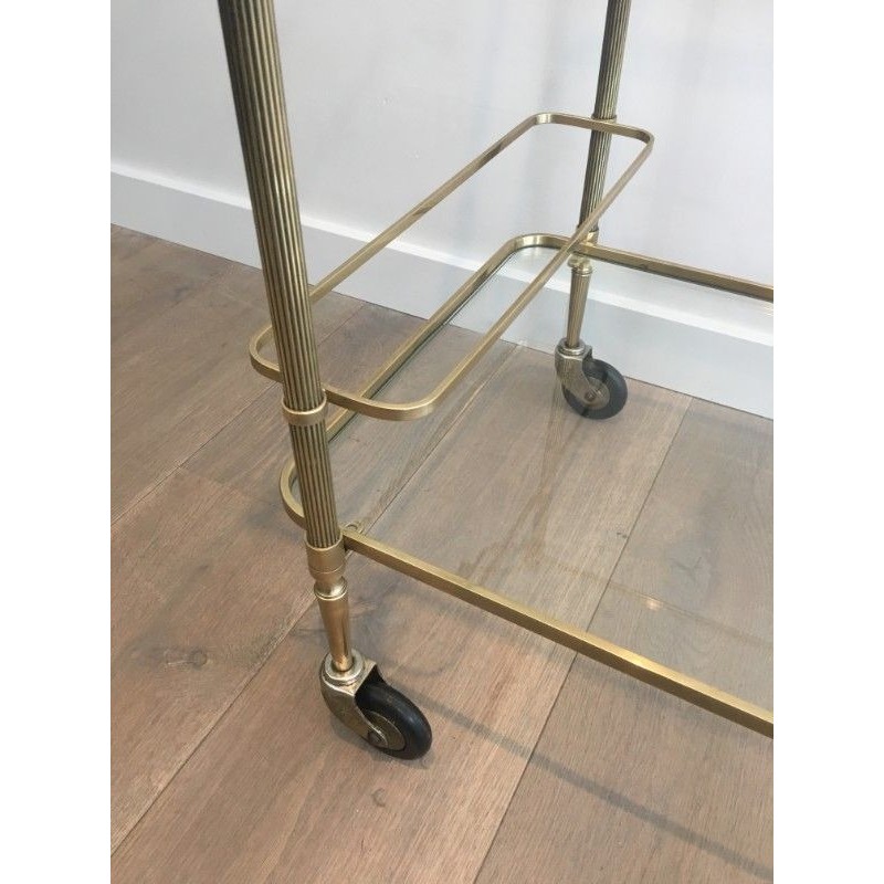 Neoclassical brass drinks trolley by Maison Bagués. Circa 1940