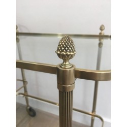 Neoclassical brass drinks trolley by Maison Bagués. Circa 1940