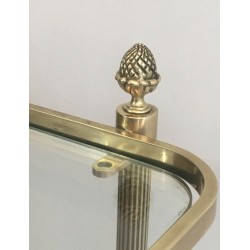 Neoclassical brass drinks trolley by Maison Bagués. Circa 1940