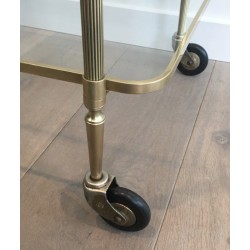 Neoclassical brass drinks trolley by Maison Bagués. Circa 1940