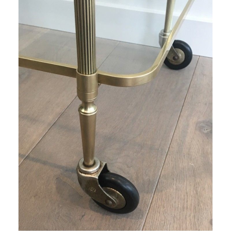 Neoclassical brass drinks trolley by Maison Bagués. Circa 1940