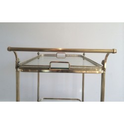 Neoclassical brass drinks trolley by Maison Bagués. Circa 1940