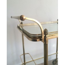 Neoclassical brass drinks trolley by Maison Bagués. Circa 1940