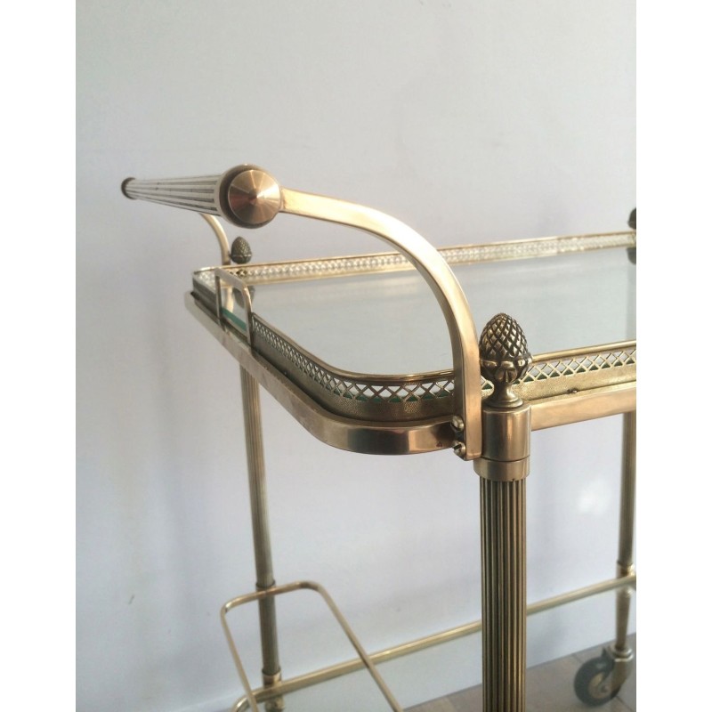 Neoclassical brass drinks trolley by Maison Bagués. Circa 1940