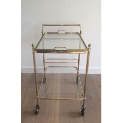 Neoclassical brass drinks trolley by Maison Bagués. Circa 1940